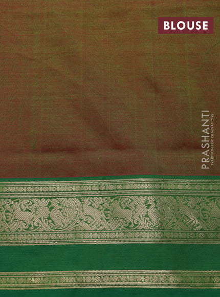 Kanchipuram silk cotton saree dual shade of greenish red and green with paisley zari woven buttas and rettapet zari woven border