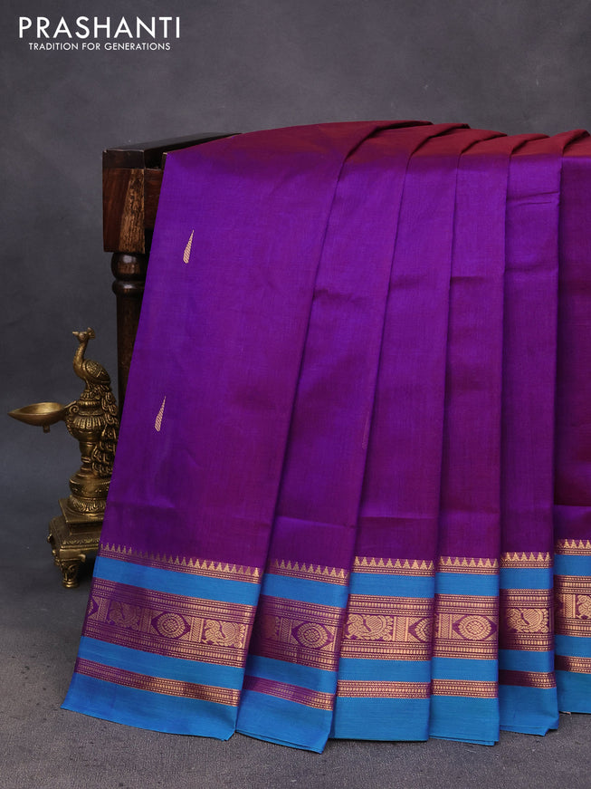 Kanchipuram silk cotton saree dual shade of purple and cs blue with zari woven buttas and zari woven border