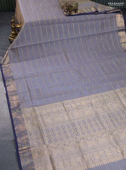 Kanchipuram silk cotton saree dual shade of grey and navy blue with allover zari strips pattern and elephant zari woven boder