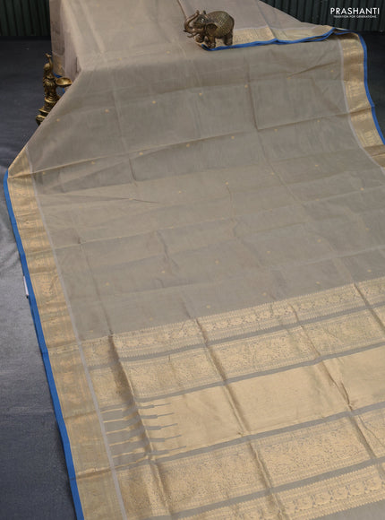 Kanchipuram silk cotton saree beige and cs blue with zari woven buttas and annam zari woven border