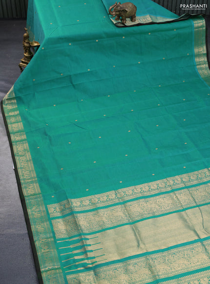 Kanchipuram silk cotton saree teal green shade with zari woven buttas and annam zari woven border