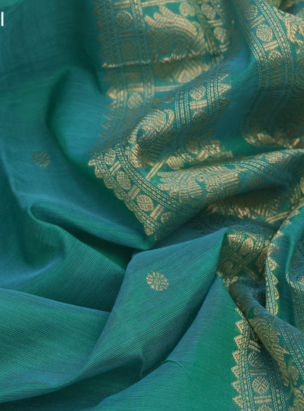 Kanchipuram silk cotton saree teal green shade with zari woven buttas and annam zari woven border