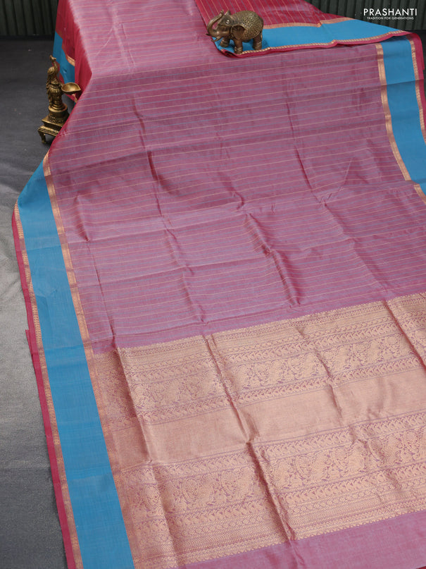 Kanchipuram silk cotton saree dual shade of red and teal blue with allover thread weaves and rettapet zari woven border