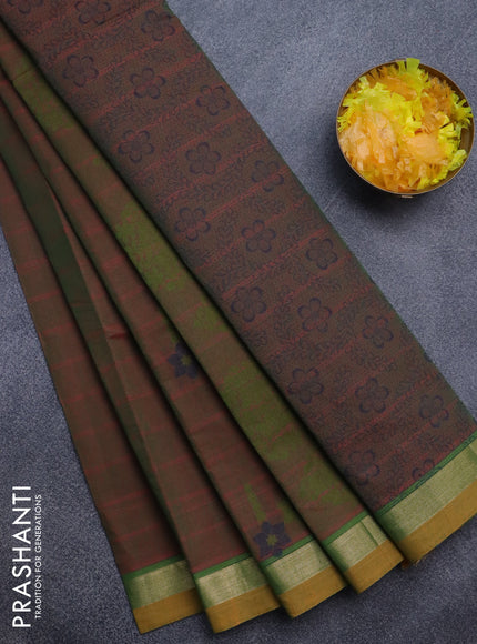 Nithyam cotton saree dual shade of greenish pink and mustard shade with thread woven floral buttas and zari woven simple border