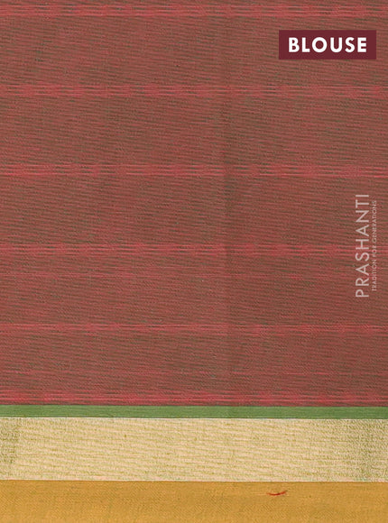 Nithyam cotton saree dual shade of greenish pink and mustard shade with thread woven floral buttas and zari woven simple border