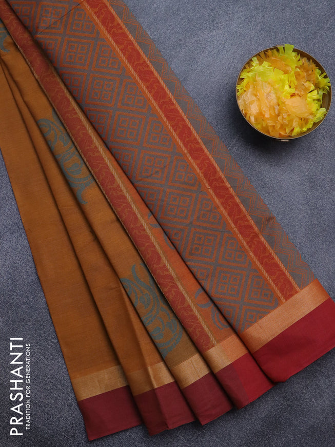 Nithyam cotton saree dark mustard and maroon with thread woven buttas and zari woven simple border