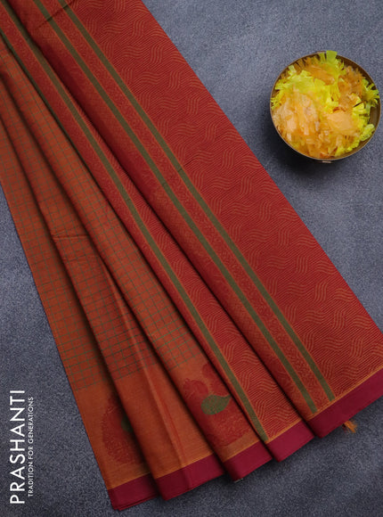 Nithyam cotton saree rust shade and maroon with allover thread checked pattern and thread woven butta border