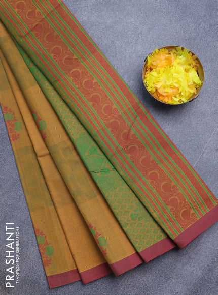 Nithyam cotton saree mustard shade and maroon with thread woven buttas and simple border