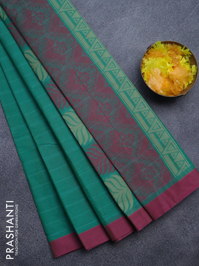 Nithyam cotton saree teal green and pink with thread woven buttas and simple border