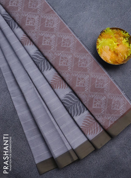 Nithyam cotton saree grey and dual shade of sap green with thread woven buttas and simple border