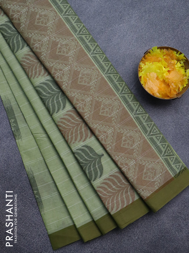 Nithyam cotton saree mild pista green and sap green with thread woven buttas and simple border