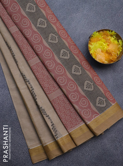 Nithyam cotton saree beige and sandal with allover thread weaves & buttas and zari woven simple border