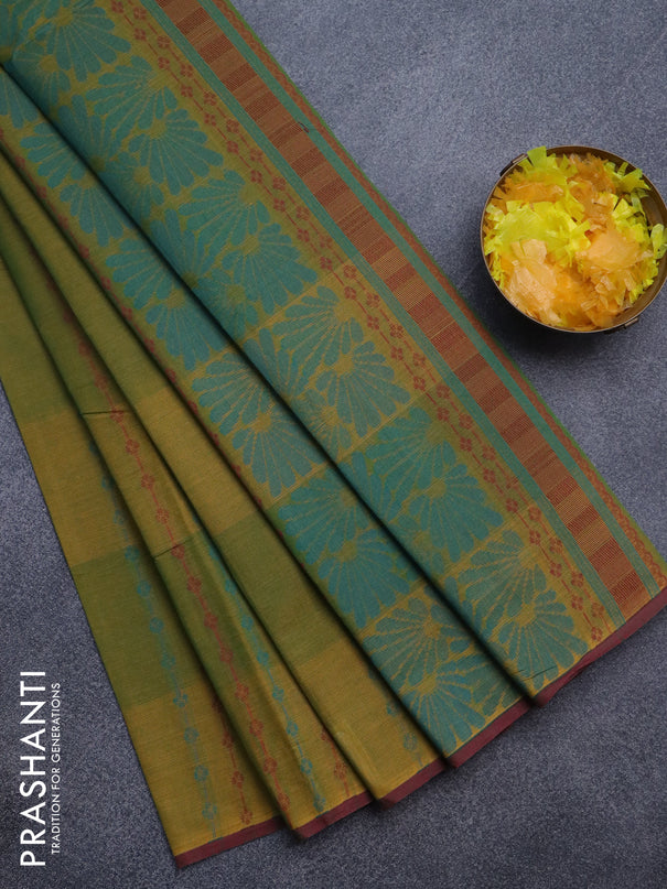 Nithyam cotton saree dual shade of mustard green and maroon with allover thread weaves & buttas and piping border