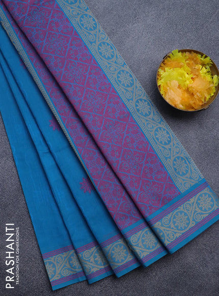 Nithyam cotton saree cs blue with allover self emboss & thread buttas and thread woven border