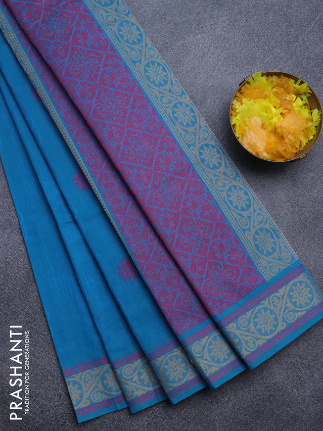 Nithyam cotton saree cs blue with allover self emboss & thread buttas and thread woven border