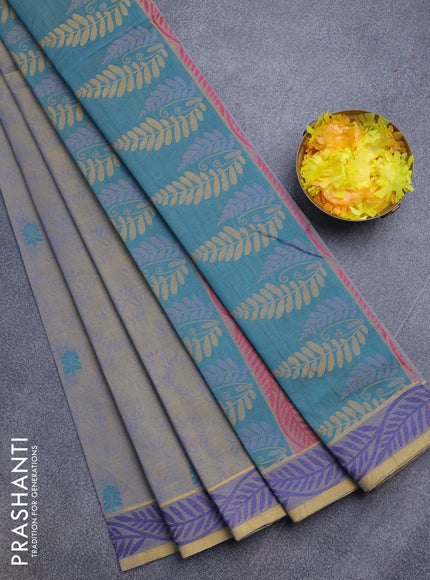 Nithyam cotton saree dual shade of yellowish blue with allover self emboss & thread buttas and thread woven border