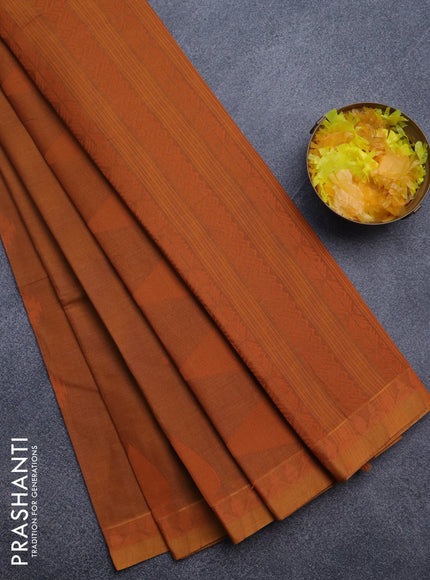 Nithyam cotton saree rust shade with allover thread woven buttas and woven border