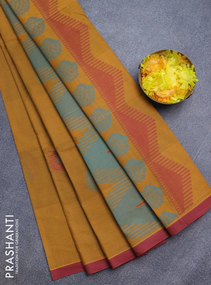 Nithyam cotton saree mustard shade and maroon with thread woven buttas and simple border