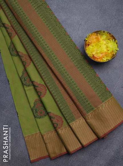 Nithyam cotton saree light green and maroon shade with allover self emboss & thread buttas and thread woven border