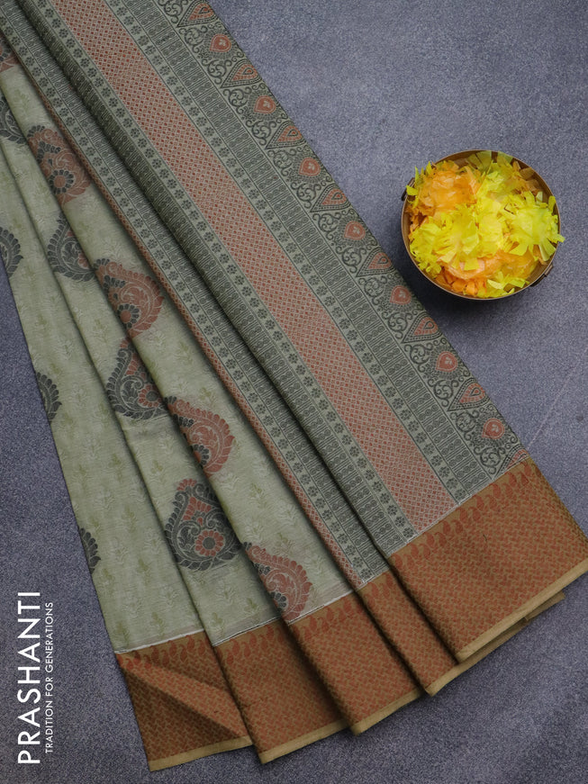 Nithyam cotton saree pastel green with allover self emboss & thread buttas and thread woven border