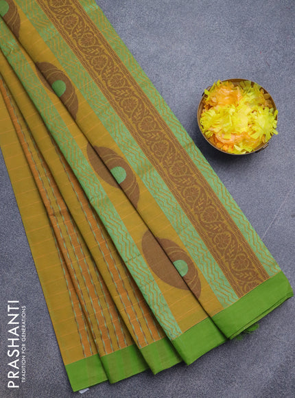 Nithyam cotton saree mustard yellow and light green with allover thread & zari weaves and simple border