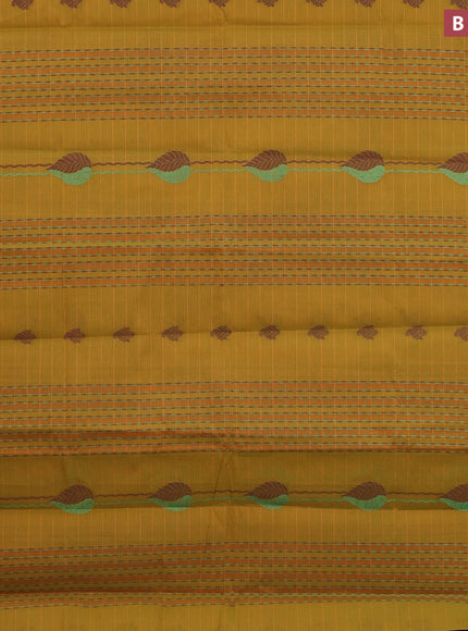 Nithyam cotton saree mustard yellow and light green with allover thread & zari weaves and simple border