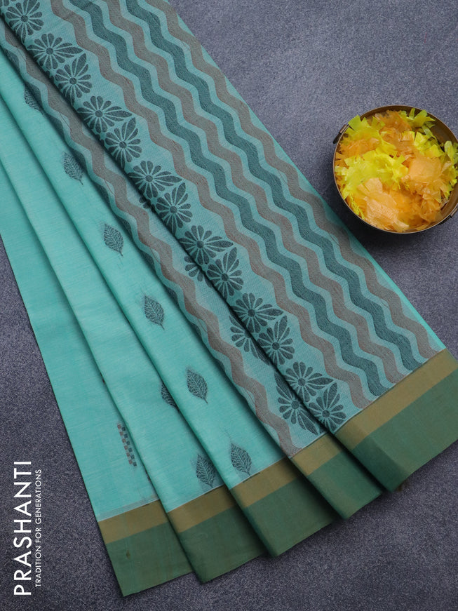 Nithyam cotton saree teal blue shade and green with allover thread woven buttas and simple border