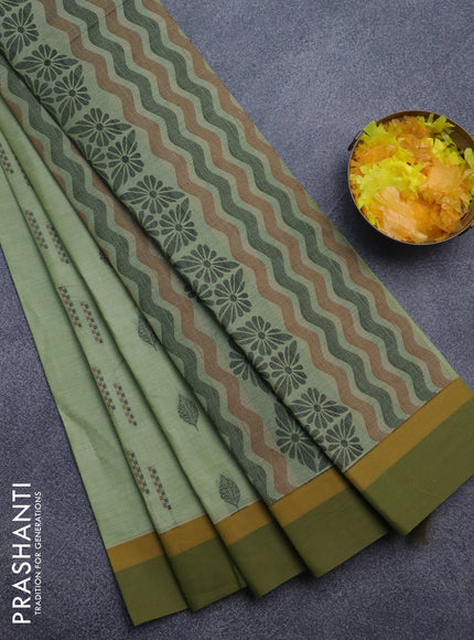 Nithyam cotton saree pista green and mehendi green with allover thread woven buttas and simple border