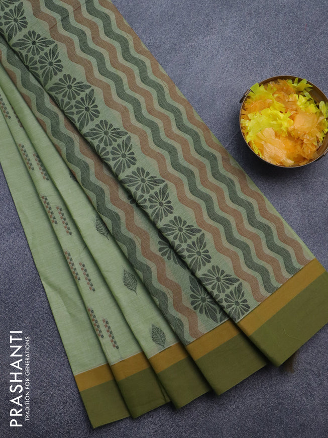 Nithyam cotton saree pista green and mehendi green with allover thread woven buttas and simple border