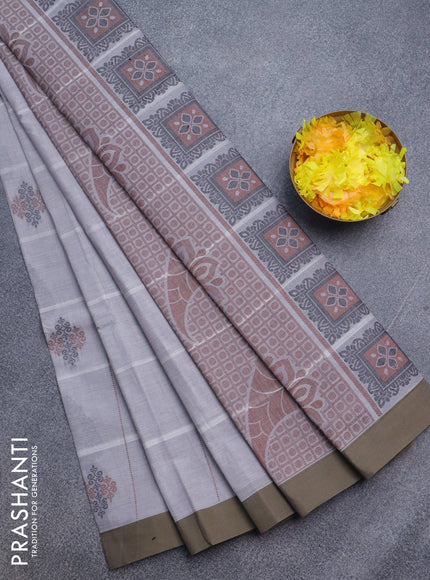 Nithyam cotton saree grey and sap green with allover thread strips & buttas and simple border