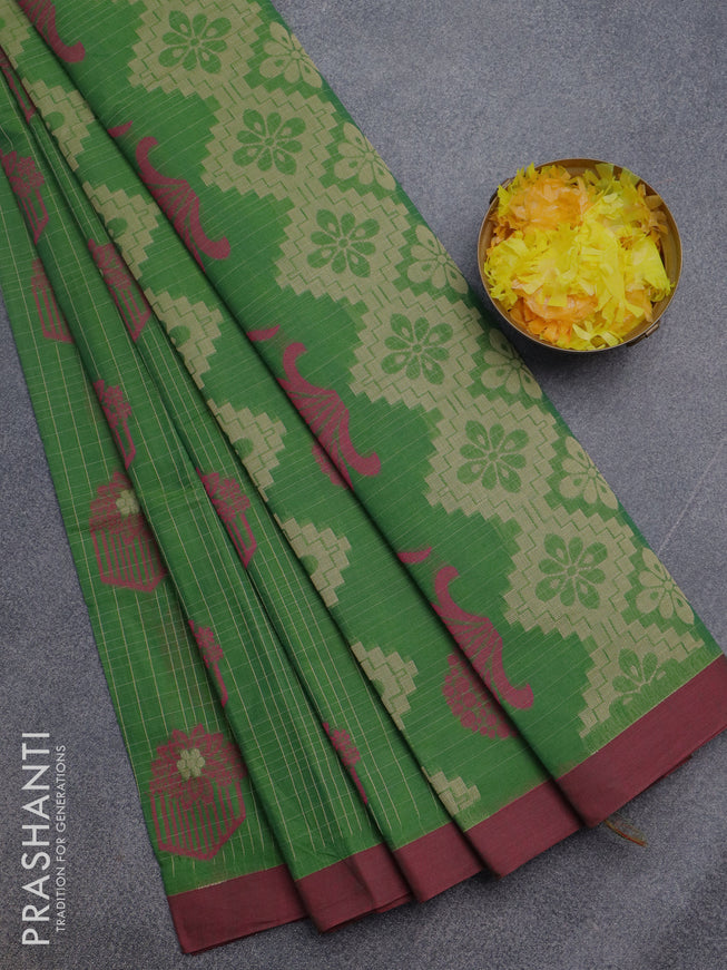 Nithyam cotton saree green and maroon with allover checked pattern & thread buttas and simple border