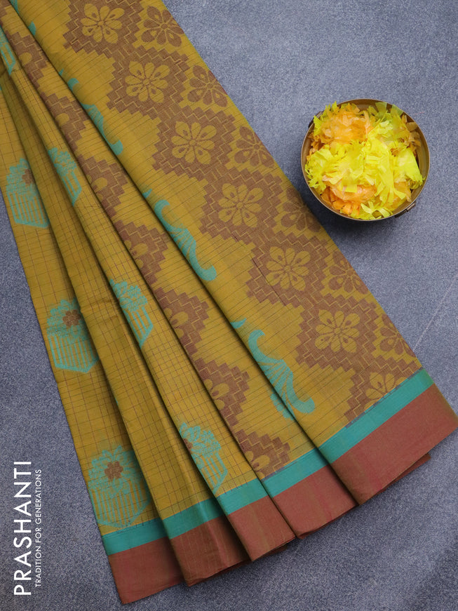 Nithyam cotton saree mustard shade and maroon with allover checked pattern & thread buttas and simple border