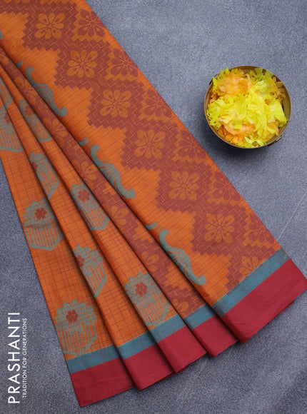 Nithyam cotton saree rustic orange and maroon with allover checked pattern & thread buttas and simple border