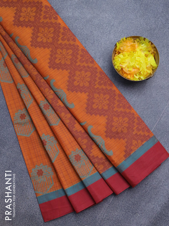 Nithyam cotton saree rustic orange and maroon with allover checked pattern & thread buttas and simple border