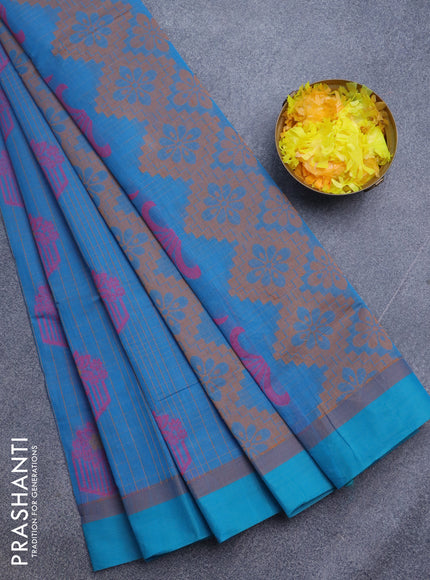 Nithyam cotton saree cs blue with allover checked pattern & thread buttas and simple border