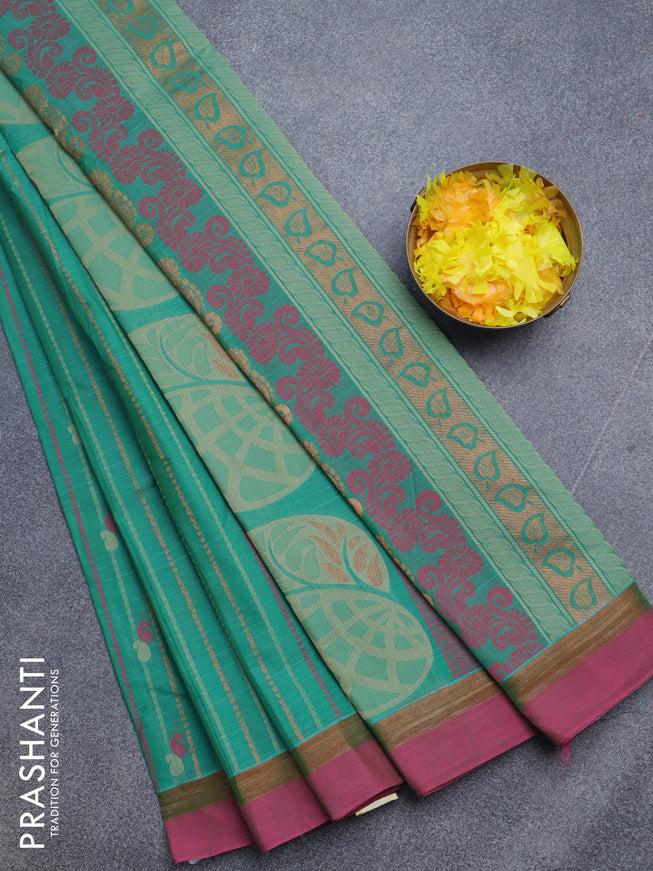 Nithyam cotton saree teal green and pink with allover thread weaves & buttas and zari woven simple border