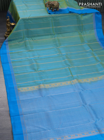 Kanchipuram silk saree dual shade of teal blue and cs blue with alllover zari weaves and zari woven simple border