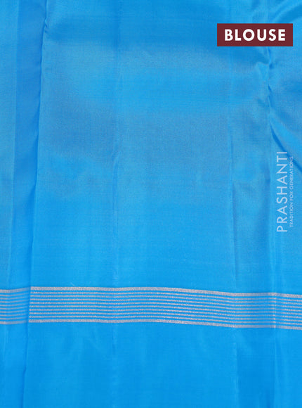 Kanchipuram silk saree dual shade of teal blue and cs blue with alllover zari weaves and zari woven simple border