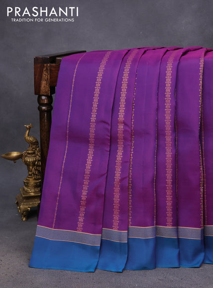 Kanchipuram silk saree purple and peacock blue with alllover zari weaves and zari woven simple border