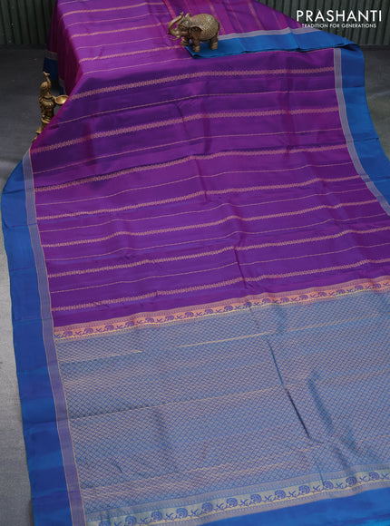 Kanchipuram silk saree purple and peacock blue with alllover zari weaves and zari woven simple border