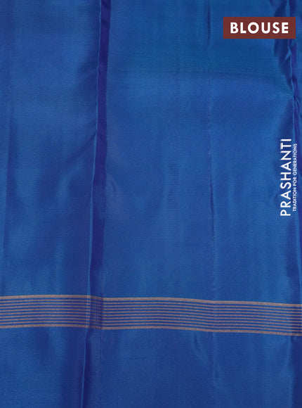 Kanchipuram silk saree purple and peacock blue with alllover zari weaves and zari woven simple border