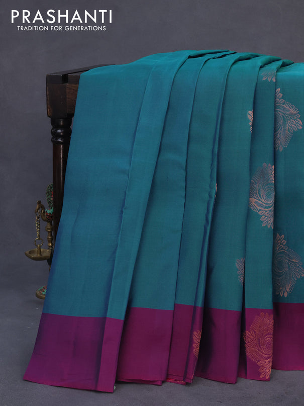 Kanchipuram silk saree peacock blue and purple with copper zari woven buttas and simple border