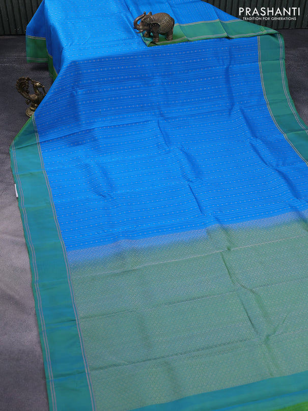 Kanchipuram silk saree cs blue and dual shade of green with allover zari weaves and rettapet zari woven border