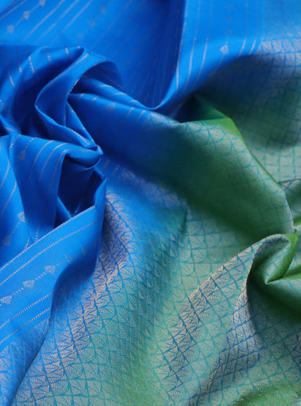 Kanchipuram silk saree cs blue and dual shade of green with allover zari weaves and rettapet zari woven border