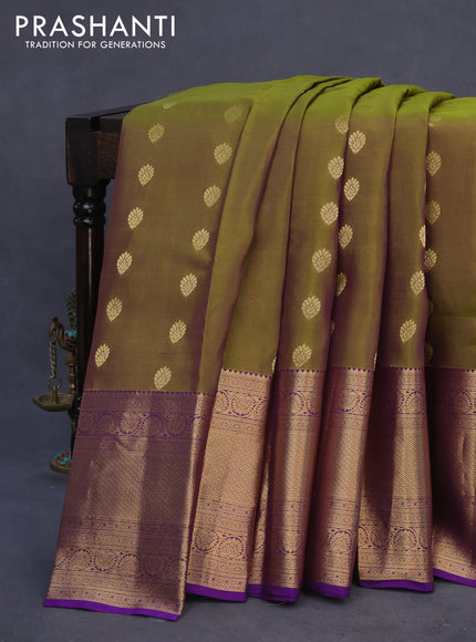 Kanchipuram silk saree dual shade of sap green and violet with allover zari woven buttas and long zari woven border