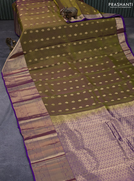 Kanchipuram silk saree dual shade of sap green and violet with allover zari woven buttas and long zari woven border