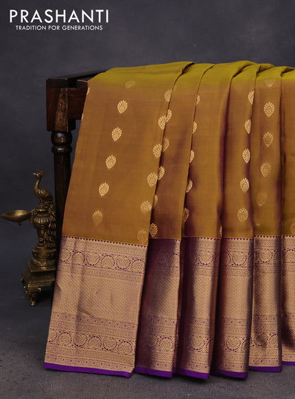 Kanchipuram silk saree dual shade of mehendi green and violet with allover zari woven buttas and long zari woven border