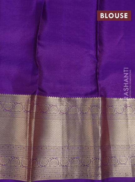 Kanchipuram silk saree dual shade of mehendi green and violet with allover zari woven buttas and long zari woven border