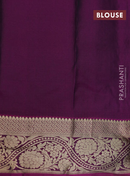 Kanchipuram silk saree peacock green and magenta pink with allover zari woven buttas and floral zari woven border