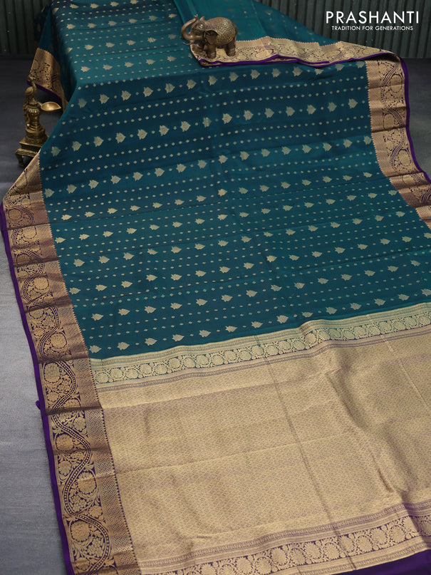 Kanchipuram silk saree peacock green and violet with allover zari woven buttas and floral zari woven border